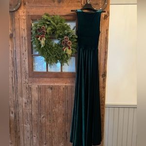 Gorgeous velvet hunter green floor length gown.